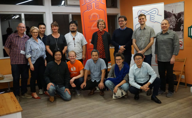 Group picture of a small group at the Platform Cooperativism Consortium conference 2018 in Hong Kong
